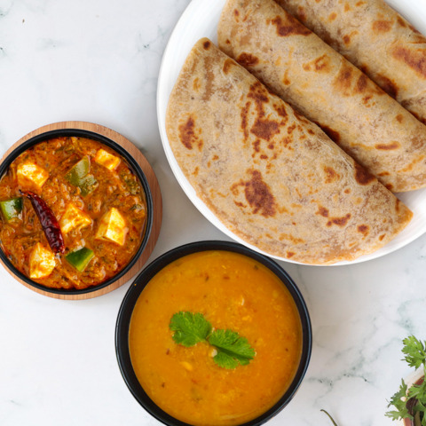 Kadhai Paneer Yellow Dal Tadka Paratha Thali